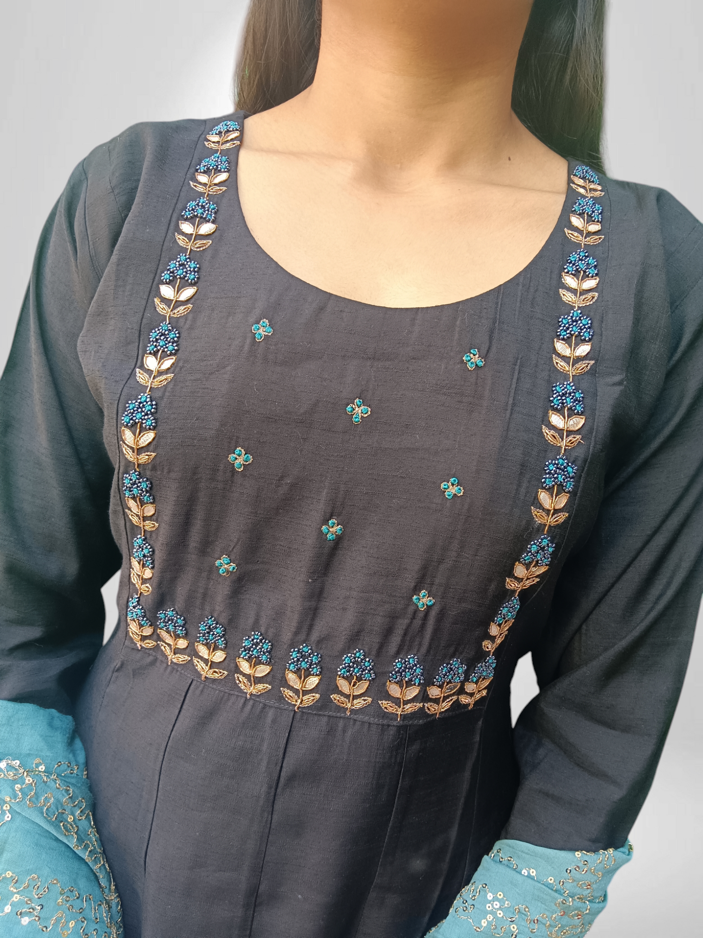 Stylish Kurti pant set with designer dupatta, featuring intricate embroidery and elegant detailing. Perfect for any occasion.