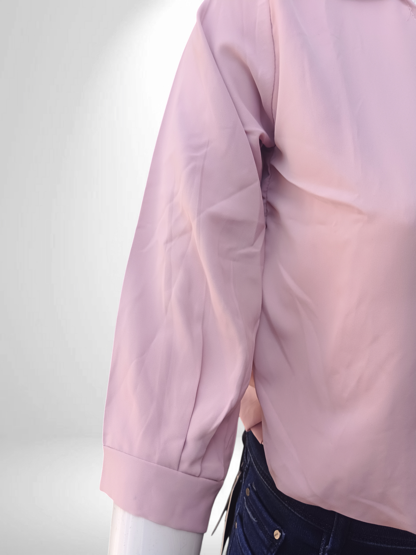 light pink cropped shirt-style top