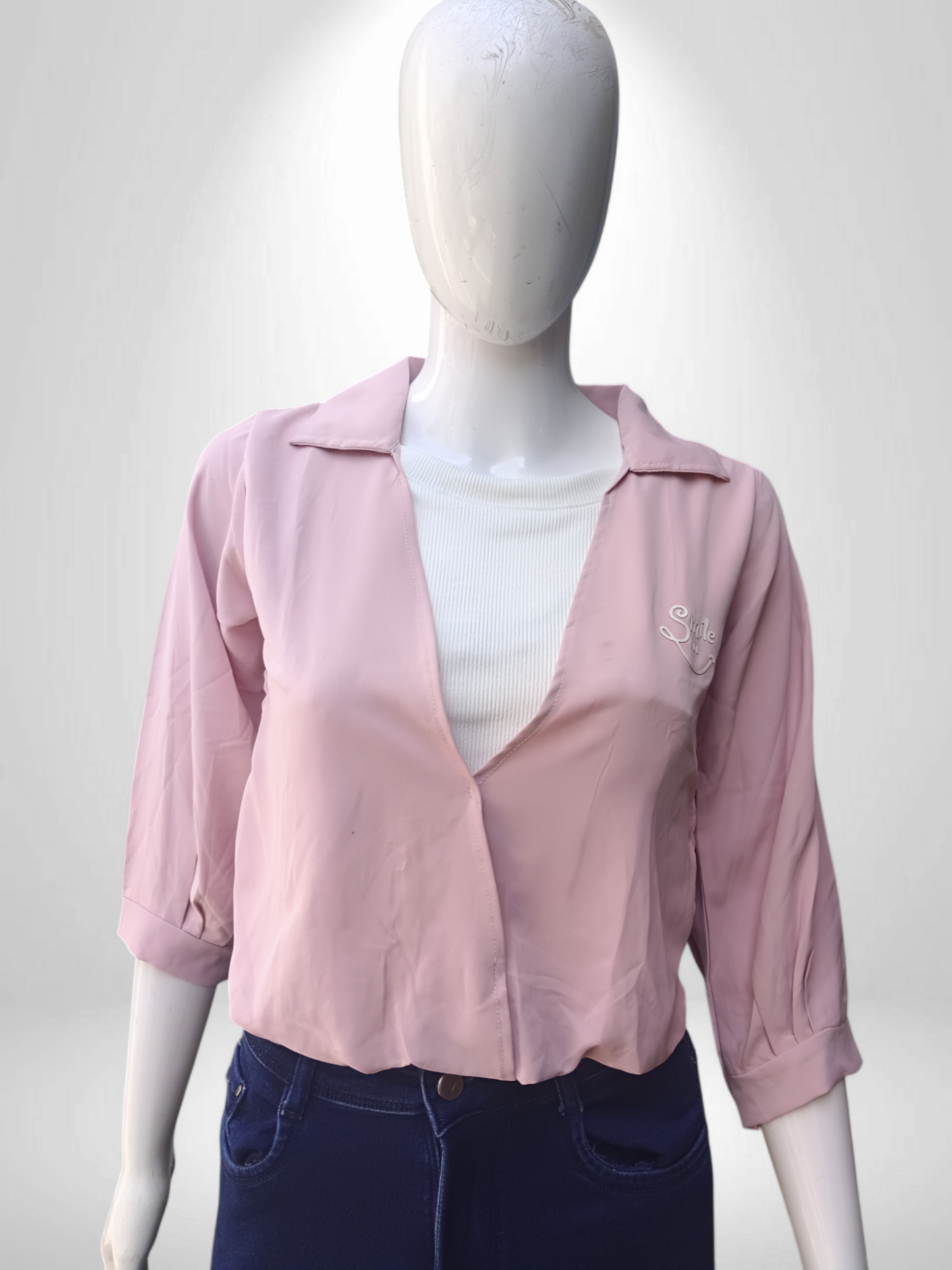 light pink cropped shirt-style top